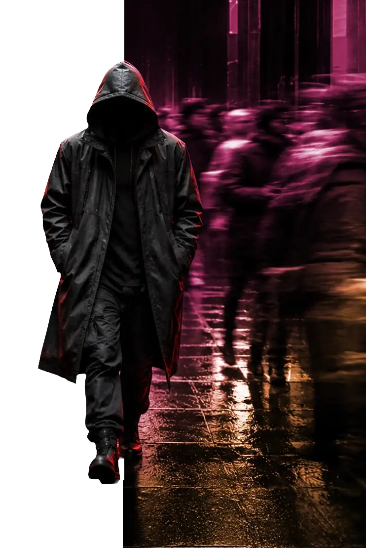 Hooded figure walking through a blurred crowd